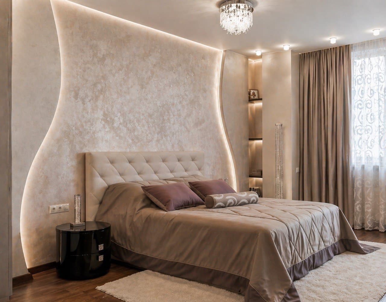 Bedroom with sculpted wall panels, decorative plaster, and soft contour lighting