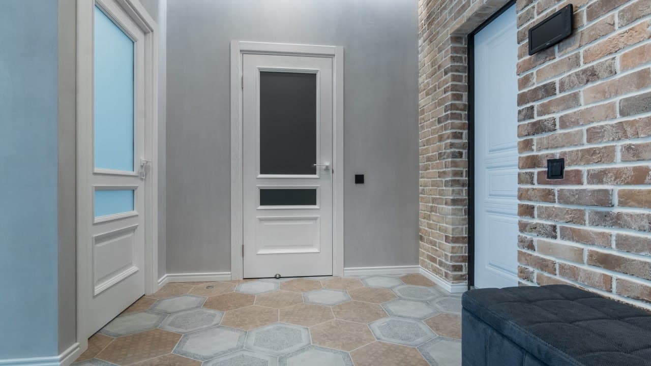 Hallway with brick walls, soft lighting, and precise wall geometry