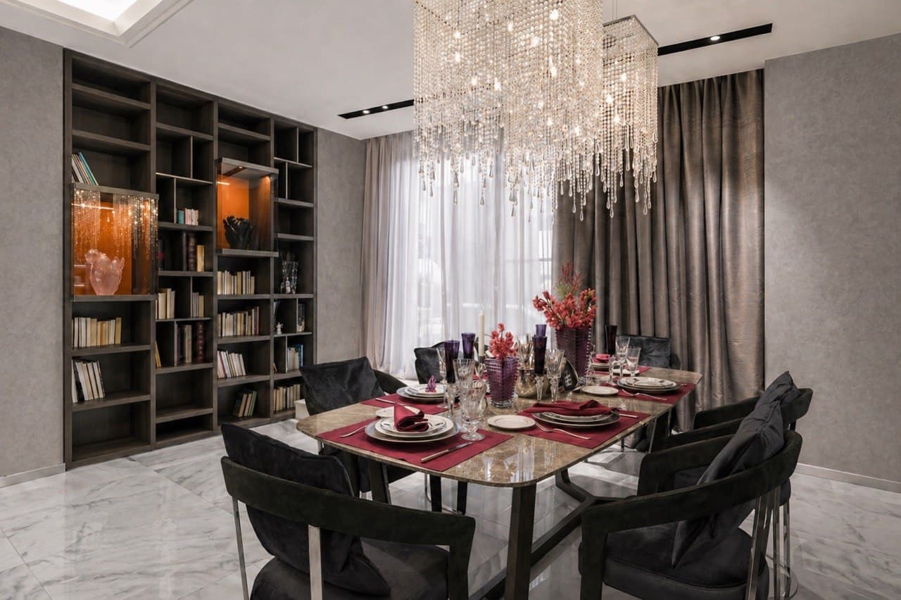 Dining room with textured walls, a statement chandelier, and open shelving