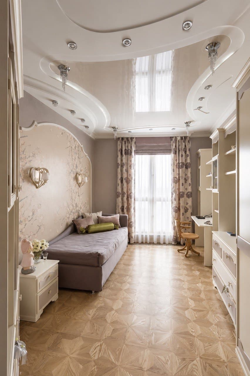 Entrance view with decorative wall panels, curved ceiling details, and custom joinery